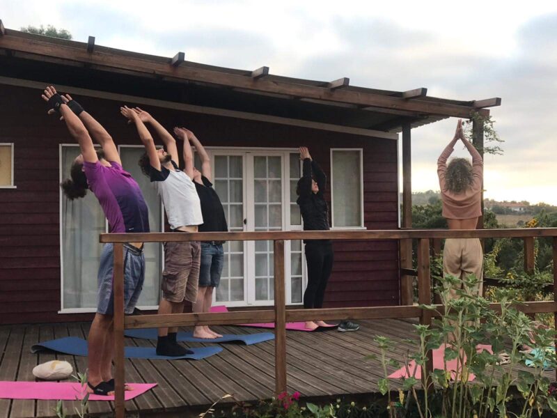 Morning Yoga Session at a Natural Building Workshop in Portugal